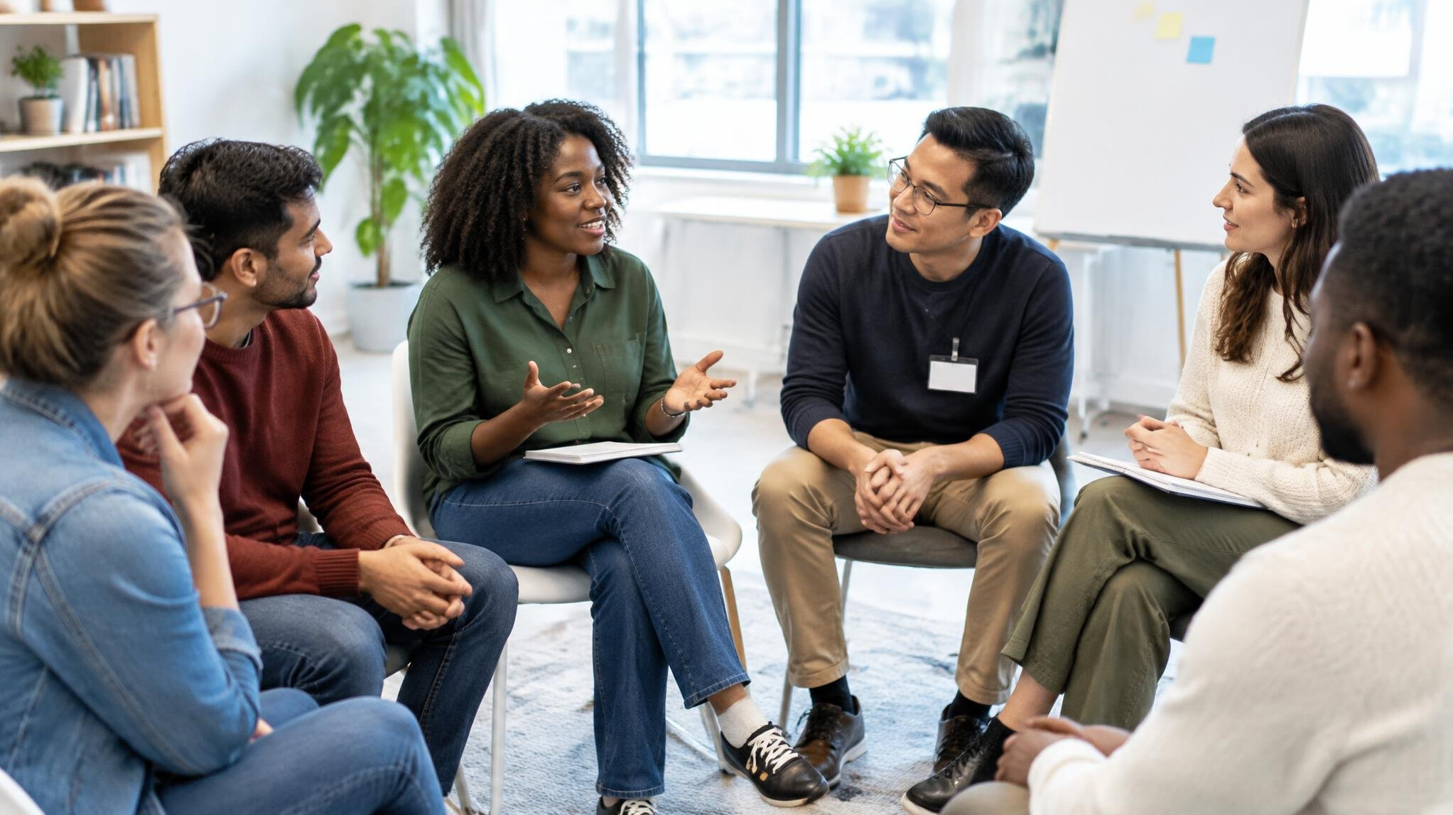 People participating in a group workshop discussion
